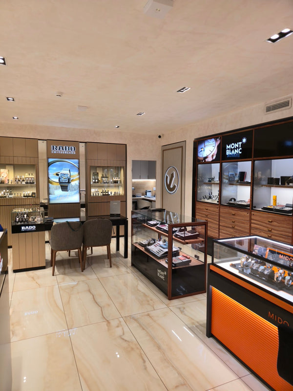 Watch De Luxe Budapest luxury retail interior showing textured walls, ceiling and watch displays